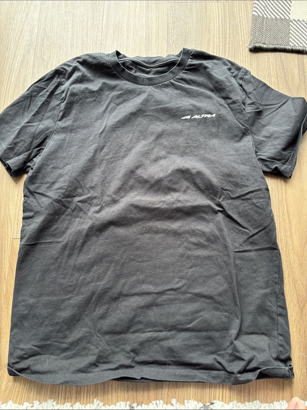 Men’s Altra “Running is Dope” t-shirt in size Medium